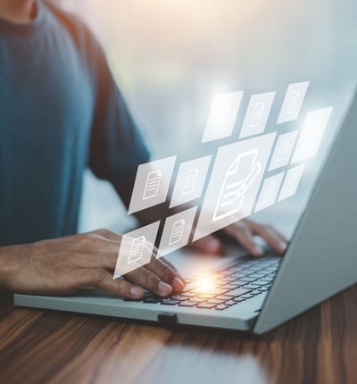 tas-hero-man-with-computer-and-documents